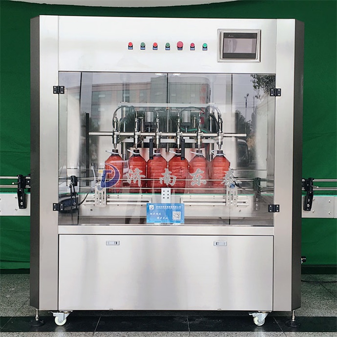 全自動油類灌裝機(jī).jpg 全自動油類灌裝機(jī).jpg