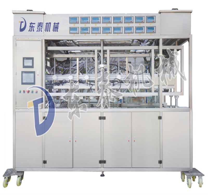 全自動(dòng)稱(chēng)重式灌裝機(jī).jpg 全自動(dòng)稱(chēng)重式灌裝機(jī).jpg